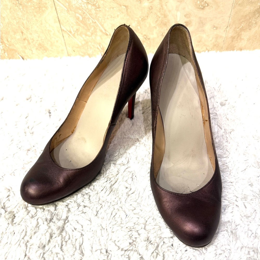 Preowned authentic Christian Louboutin simple pump size 38 metallic pink purple